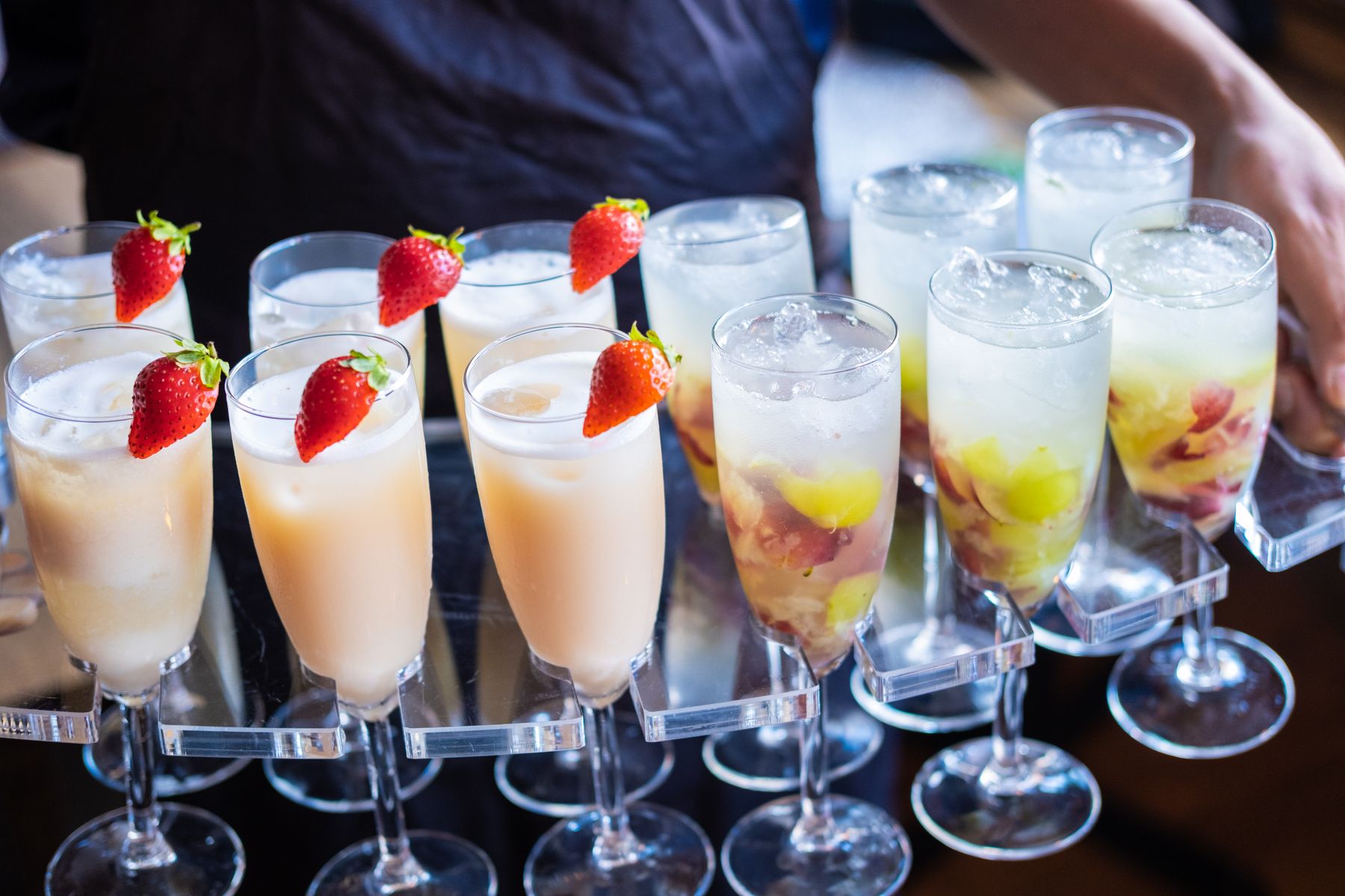 Tray of chilled drinks garnished with fruit